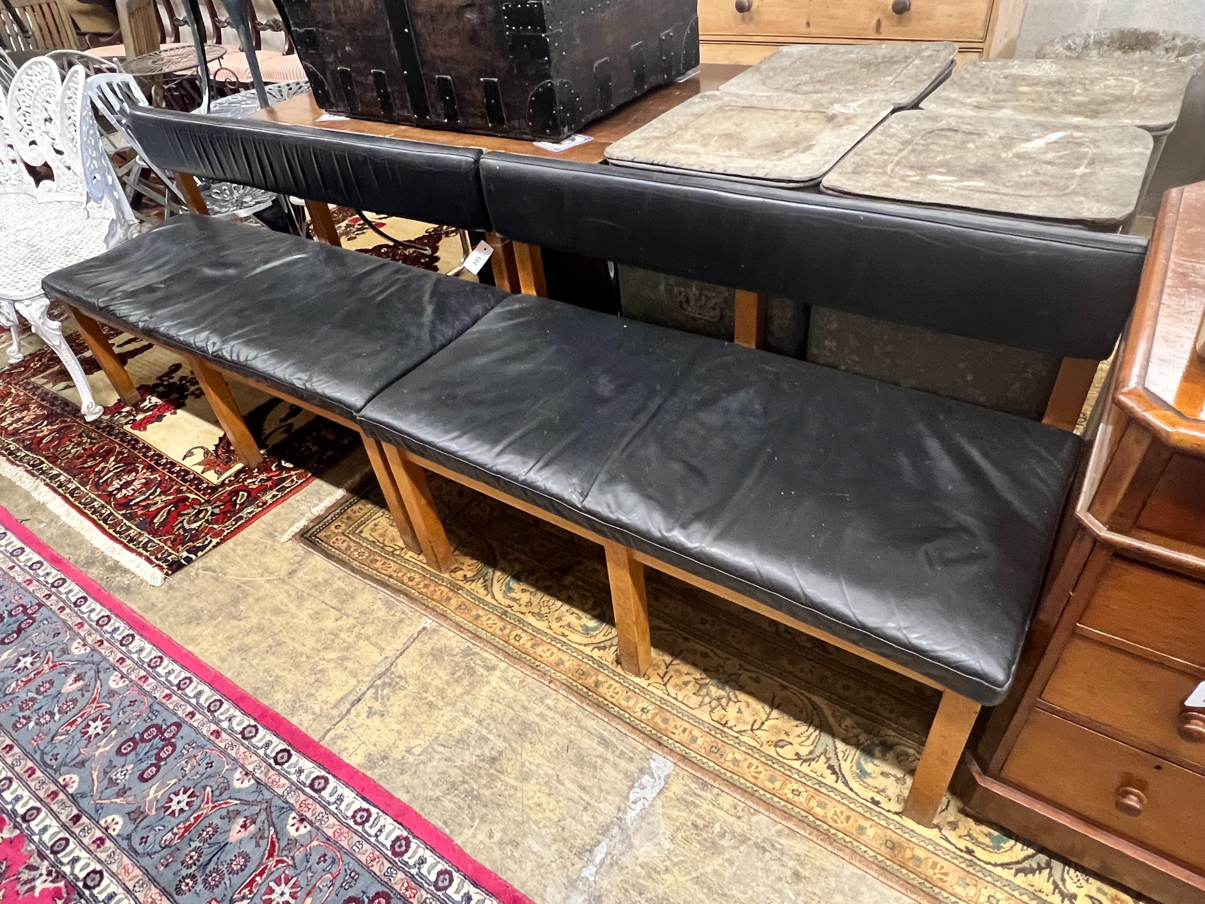 A pair of Danish benches, width 136cm depth 53cm height 76cm